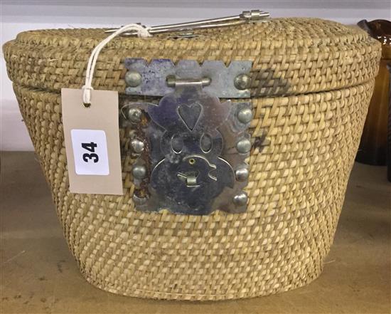 Chinese blue and white tea caddy and bowls in a basket